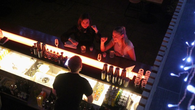 Customers at bar