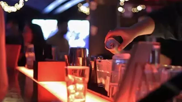 Pouring drinks at a wedding